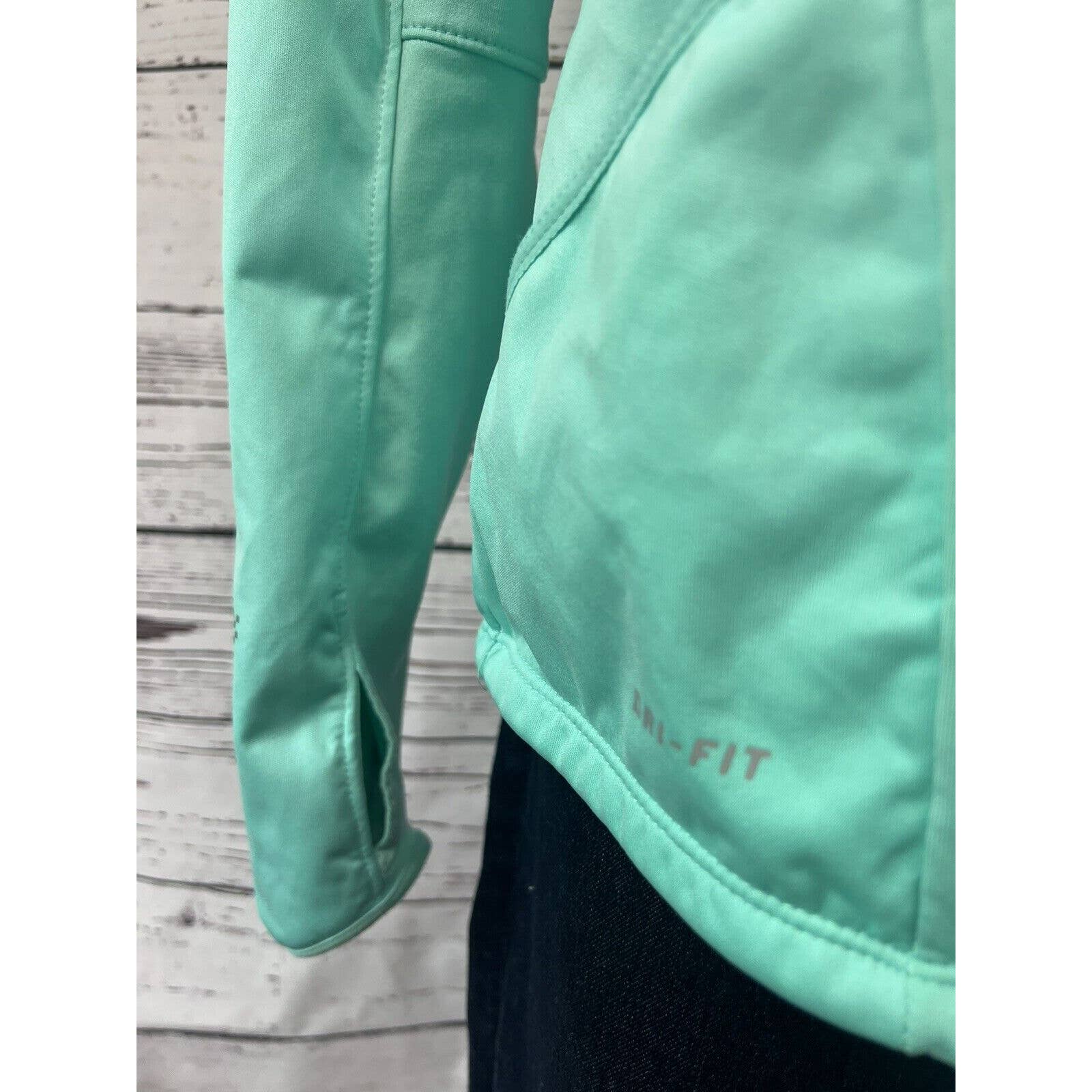 Nike Full Zip Running Jacket Women’s Small Turquoise Green Reflectors Thumb Hole